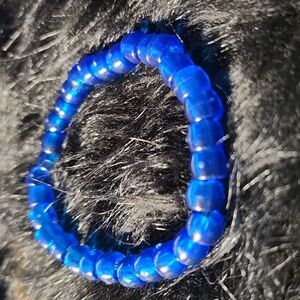 Hand Crafted blue beaded  bracelet made on a stretchy cord